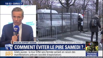 Gilets jaunes: Nicolas Dupont-Aignan demande de "ne pas aller aux Champs-Elysées"