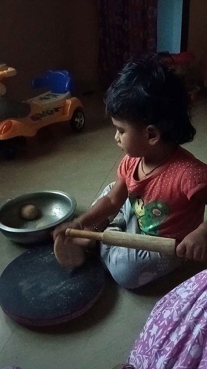 Funny chapati making - young girl getting in pr...
