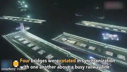 Four Bridges Rotate Simultaneously Above Busy Rail Line