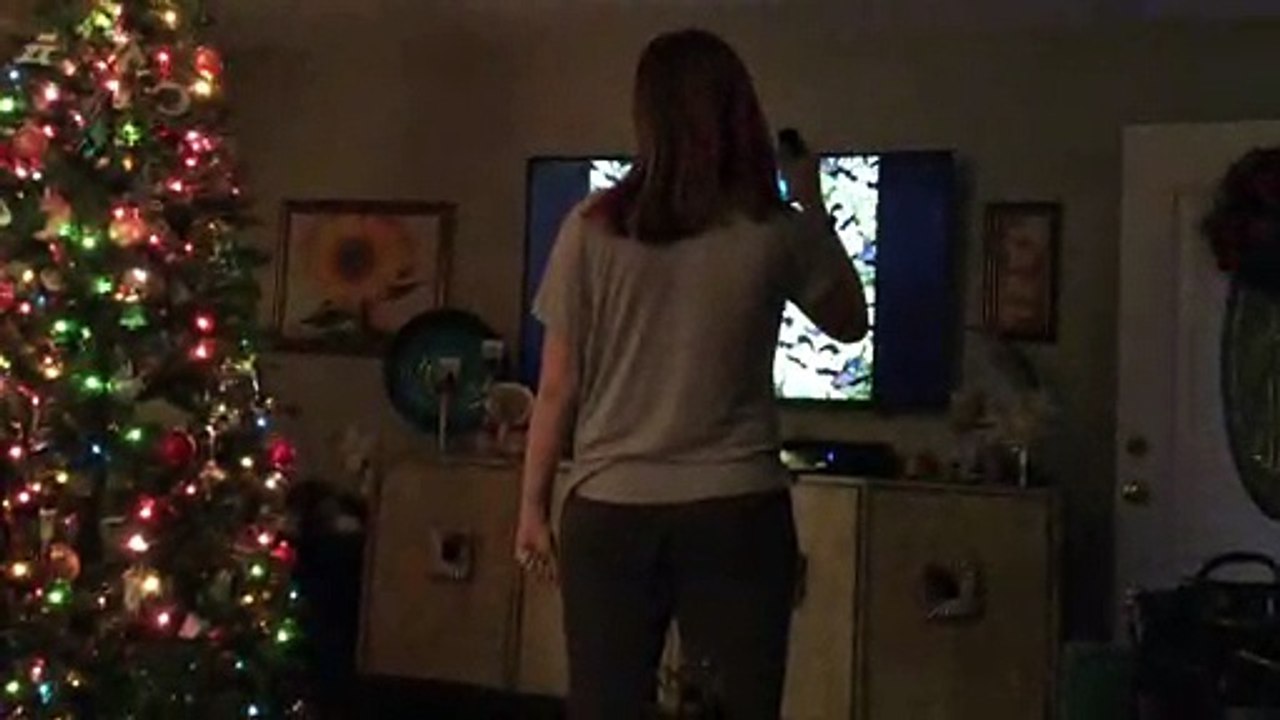 Julia playing WarioWare Smooth Moves