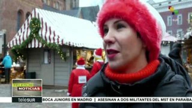 Miles de personas participan en el Maratón de Santa Claus en Letonia