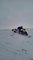 Man Accidentally Backflips off Snowmobile