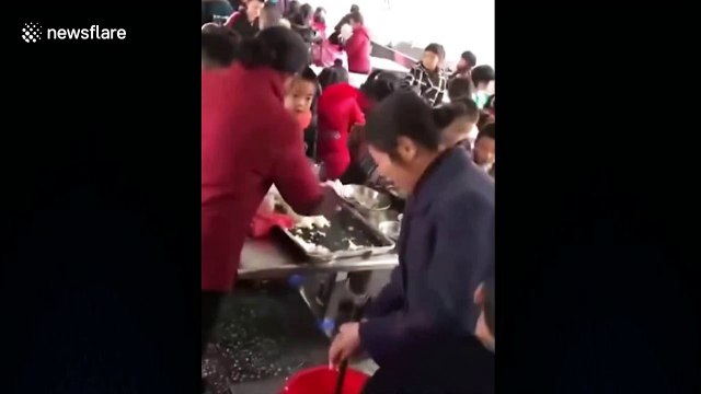 Two women sneak into school canteen to grab pupils’ food