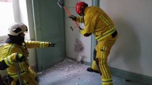 Les pompiers en exercice dans l'ancien hôtel de ville de Mouscron