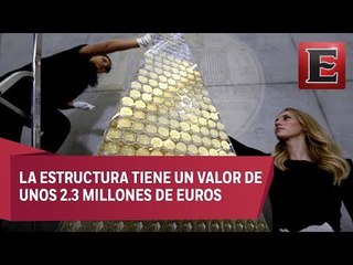Montan en Alemania árbol navideño con monedas de oro
