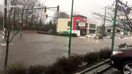 Streets flooded as heavy rains pound Metro Vancouver