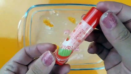 Mixing Owl Lip balm Into Clear Slime