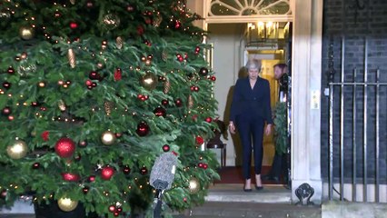 Theresa May promises to listen after winning confidence vote