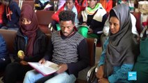 Refugees released from Libyan detention board plane for resettlement