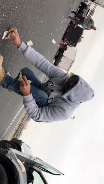 Armoured Truck Spills Money All over Highway