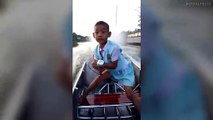 Boy Rides Motor Boat In His School Uniform!