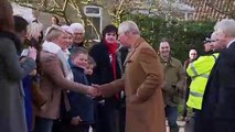Prince Charles pulls pints and plays darts in Gloucestershire