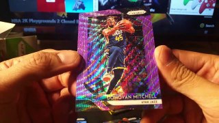 2018-19 Panini Prizm NBA Basketball trading cards. Donovan Mitchell Purple Wave. 1 autograph or memorabilia per box.