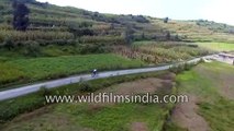 Huffing and puffing uphill on a mountain bike in mountains of Himachal