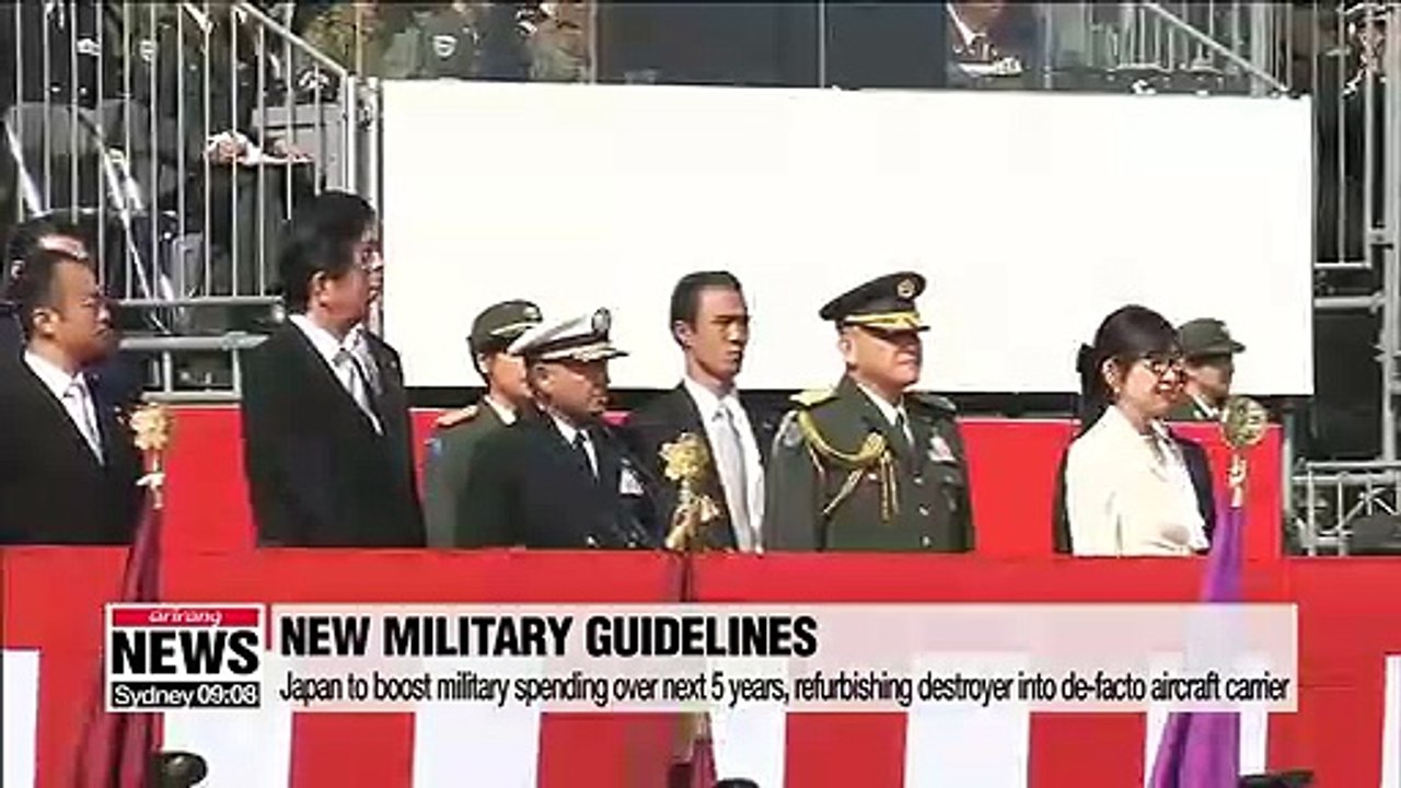 Japan adopts new defense guidelines, agrees to boost military spending over next 5 years