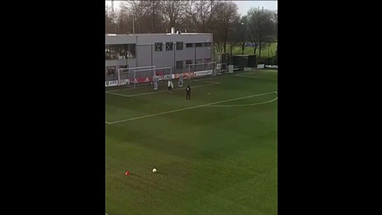 Ajax goalkeeper André Onana scores a bicycle kick in training