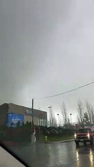Tornado Debris Floats Through Stormy Sky