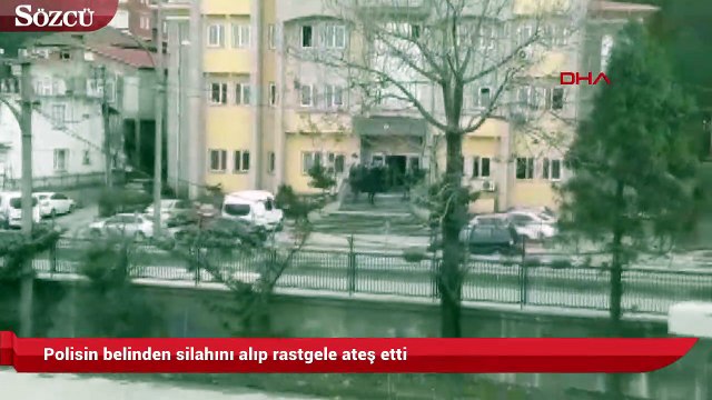 Polisin belinden silahını alıp rastgele ateş etti