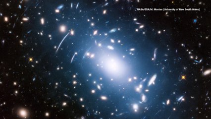Eerie Glow from Galaxy Cluster Shines Light on Dark Matter