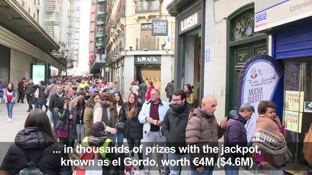 People queue up for 'El Gordo' lottery tickets in Spain