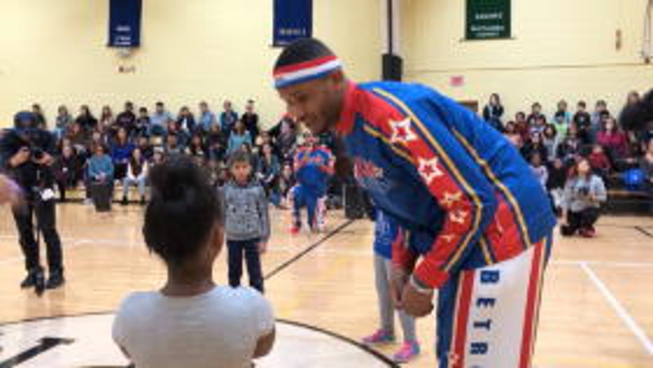 Harlem Globetrotters surprise deaf students at Long Island school