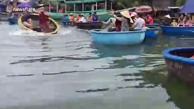 You spin me right round! Tourists take spinning basket boat challenge