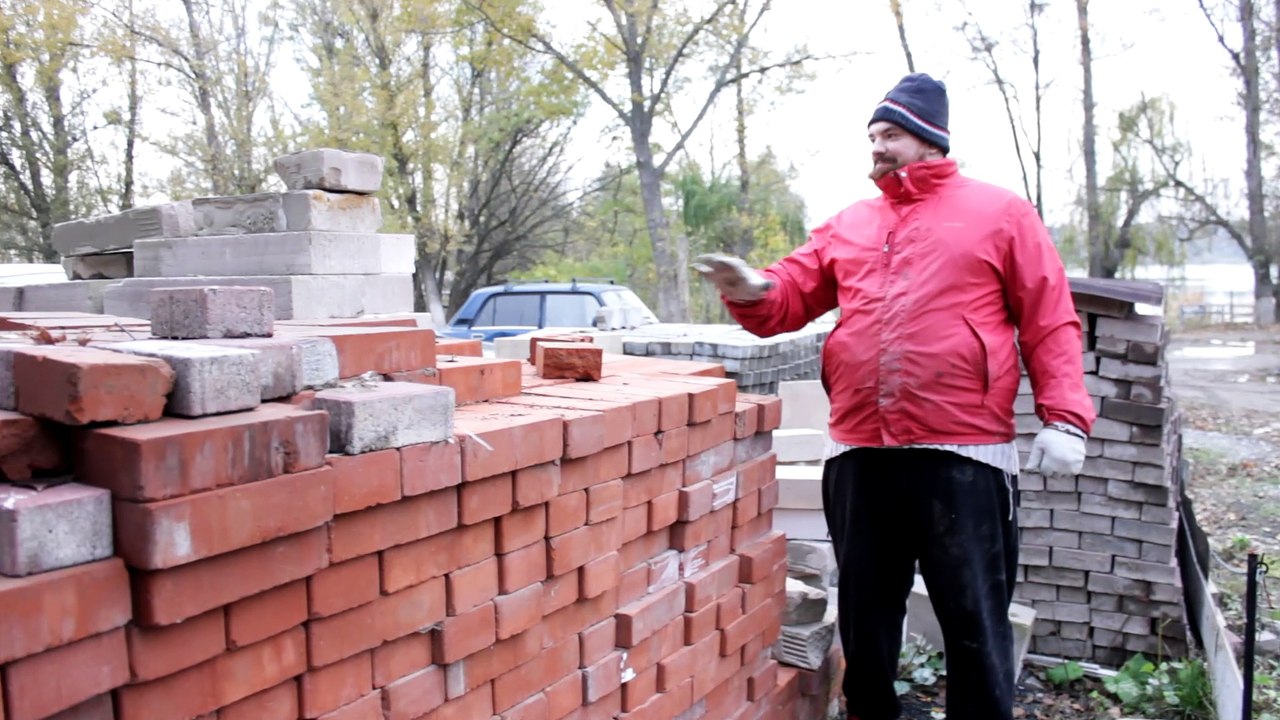 Man Breaks Bricks By Hand