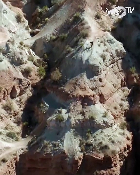 Amazing motor bike riding on the hazard mountain