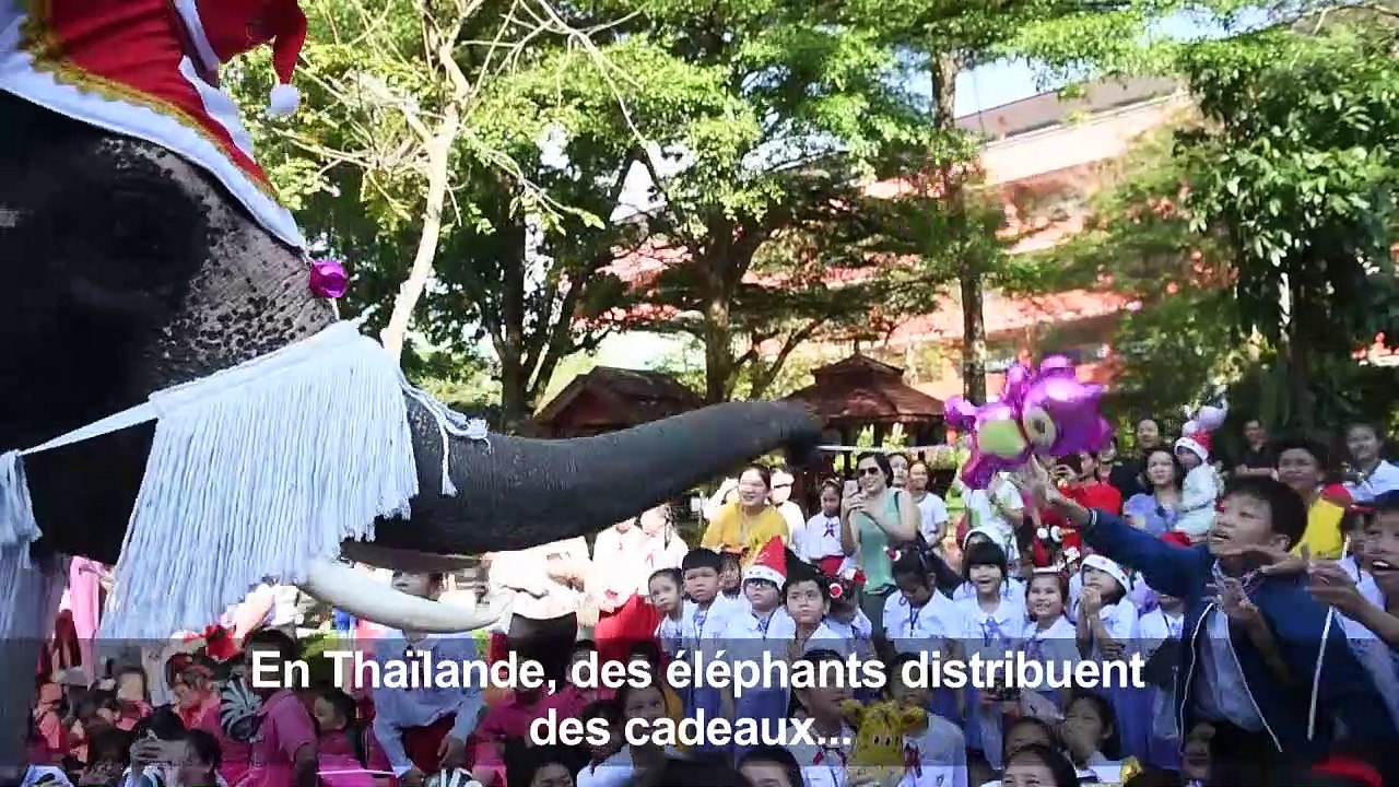 Thaïlande: un père Noël pas comme les autres pour des écoliers