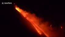 Footage shows smoke and lava flows from erupting Mt Etna