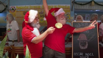 Rio's Santa Claus school graduates celebrate with a beard trim
