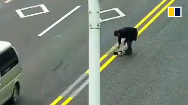 Man repaints road markings to attract customers to restaurant