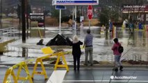 Terrifying video of car sinking into floodwaters, driver escapes just in time