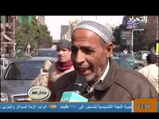 فيديو لمرشح الرئاسة الدكر امام لجنة الانتخابات يحـمل لافتة انا ترمومتر الديمقراطية واحد الجماهير يرد كفايا تخلف