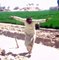 Baloch farmer dancing in the fields