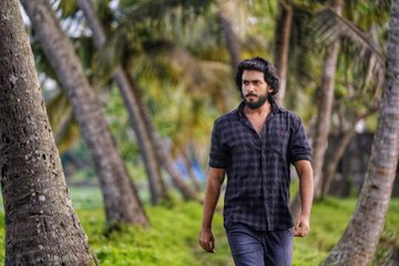 കാളിദാസ് ജയറാമിന്റെ മാസ് ലുക്ക് പുറത്ത് | filmibeat Malayalam