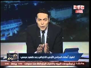 الغيطي يعرض صوره صادمه ساخراً :"مرسي ونجلاء ايام الشقاوه !"