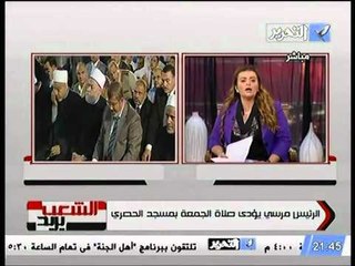 استقبال الرئيس محمد مرسي بلافتات تأييد اثناء توجهه لصلاة الجمعة