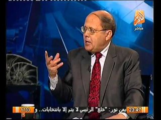 عبد الحليم قنديل  التصويت لمرسي على طريقة اكل الميتى و لحم الخنزير