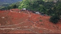 Indonesia resumes rescue work as landslide death toll rises