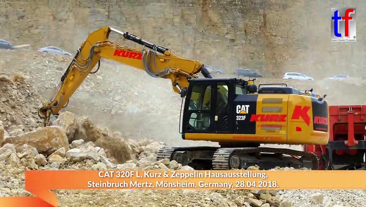 CATERPILLAR 323F L Loads a Crusher in a Quarry / Belädt einen Brecher im Steinbruch, Mönsheim, Germany, 28.04.2018.