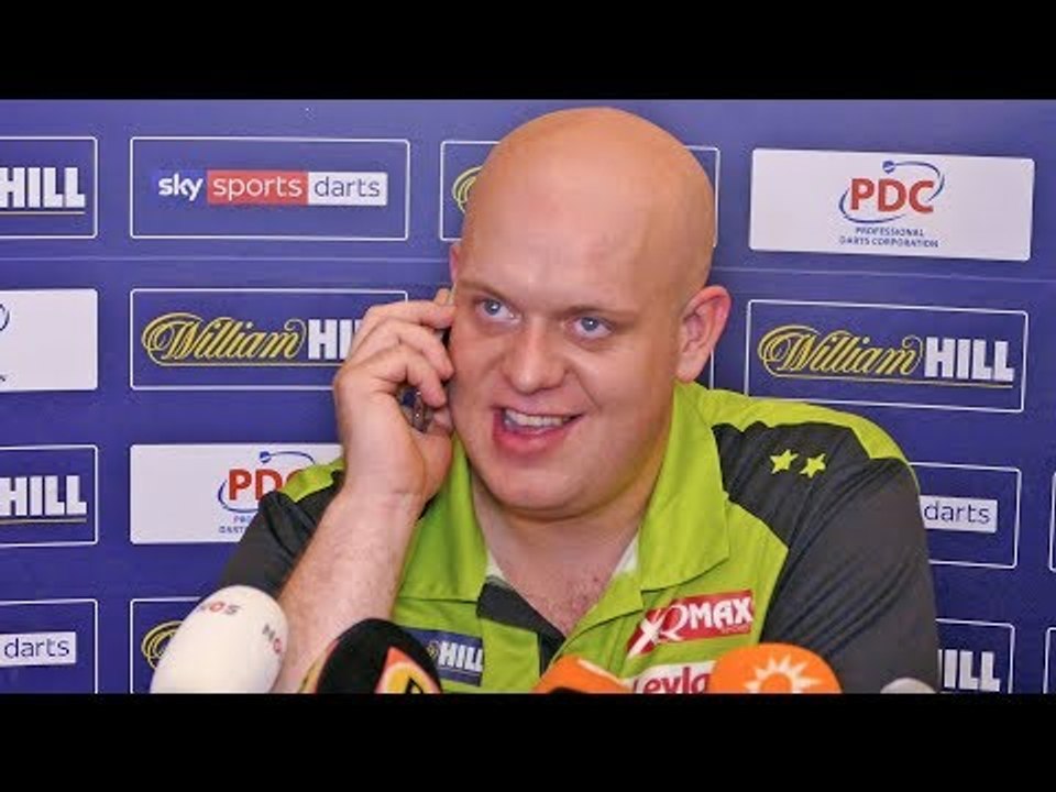 De Nederlandse premier feliciteert Michael van Gerwen met zijn derde Wereldkampioen Win