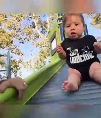 Funny video of child is sliding on stairs in funny style
