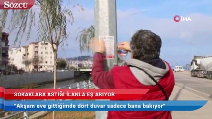 Sokaklara astığı ilanla eş arıyor