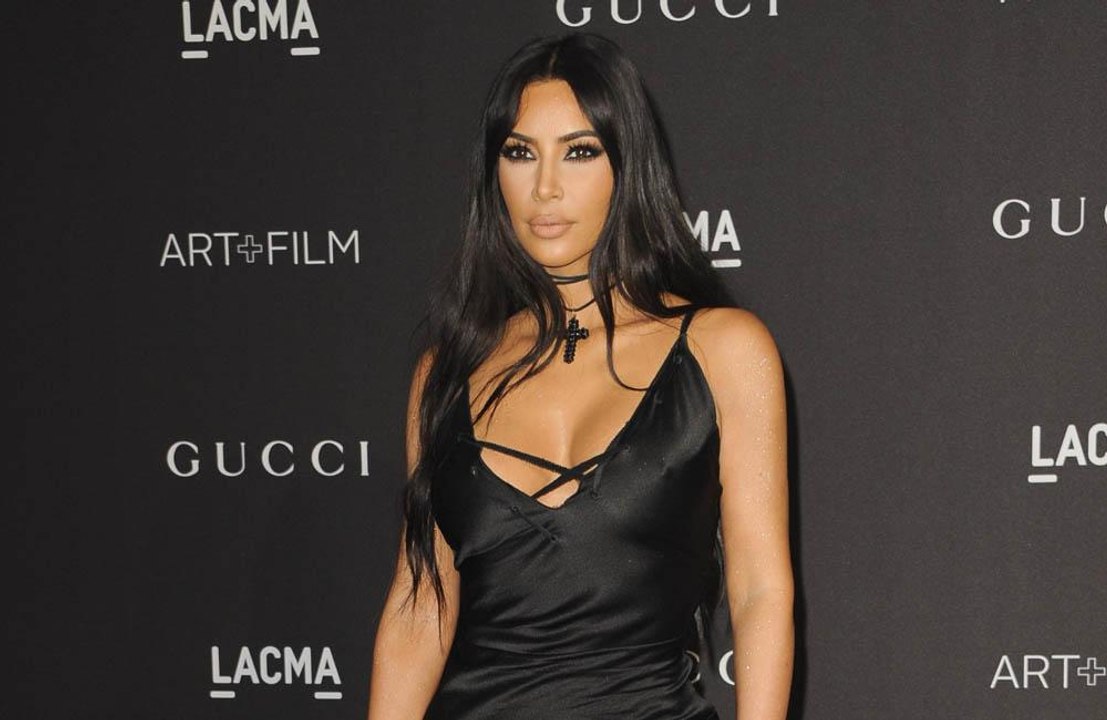 Kim Kardashian West using different surrogate