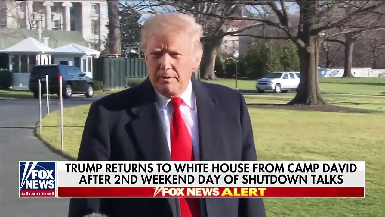 Trump makes remarks after a working visit to Camp David, says the wall will be made out of steel bei