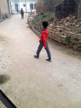 Kids playing and try to prank passer by! Lovely video...plus enjoying the sounds of the afternoon in India.