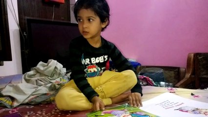 A cute little girl singing nursery rhymes