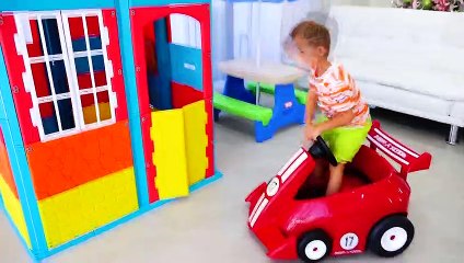 Vlad and Nikita pretend play and build colored Playhouse