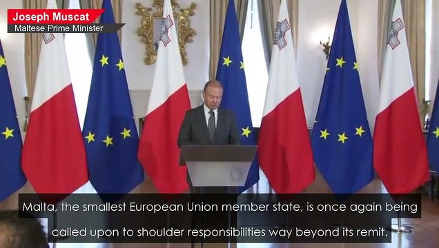 Stranded migrants celebrate being allowed to enter Europe